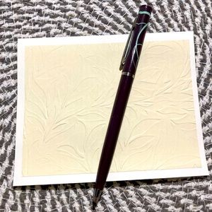 Cream and white embossed cards
